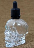 Wholesale vape skull glass bottle dropper ml ml ml clear frosted black color OEM other color e liquid dropper bottle skull glass