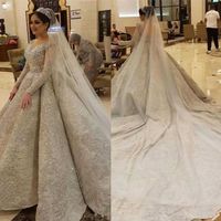 Wholesale Arabic Luxury Sequined Lace Appliqued Crystal Beaded Long Sleeves Ball Gown Wedding Dresses With Sweep Train Backless Pearl Bridal Gowns