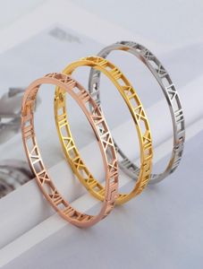 2014 Fashion Silver Roseyellow Gold 316L Acero inoxidable Números romanos huecos Joyería para mujeres 3005701