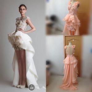 2015 Celebrity Evening Jurken Organza Hilo Arabische sexy prom bruidsjurken met applique handwerken en asymmetrische trein Weddi1451730