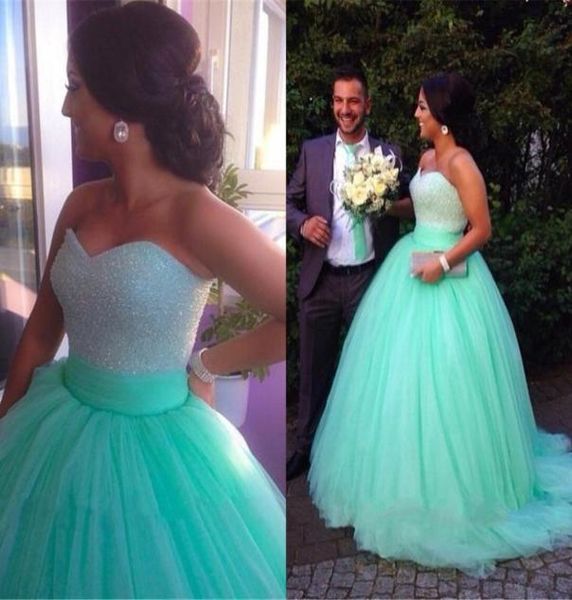 Robes de mariée vertes à menthe 2015 Robes de bal en tulle doux en tulle entièrement perlé personnalisé plus robes de mariée