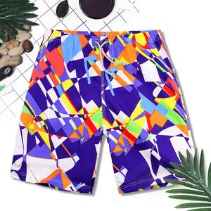 2015 NUEVA ARRIVA DE MARCA A MENS SHORTS Sport Sports Shorts Pants Board Sports Mald Loose Surf Striped Beach Shorts Moleton Ma Ggitys canales Burburiness F2FW