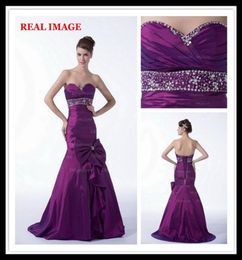 2015 vestidos de fiesta de novia de sirena púrpura plisados con vestidos de fiesta con cuentas de tafetán con lazo grande HW0131391289