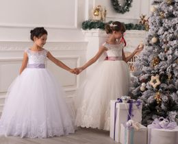 2015 tule bloem meisje jurken pure kralen appliques pluizige kerst baljurken voor bruiloft sleutelgat veter-up bogen mooie op maat gemaakte jurk