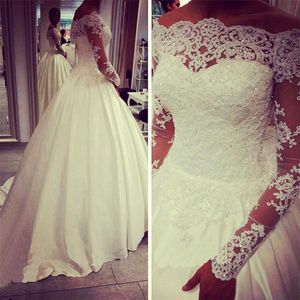 Heetste lange mouwen Trouwjurken Bateau Pailletten Applicaties Illusion Ball Gown Bruidsjurken Gepersonaliseerde Vintage Bruidsjurken Dubai