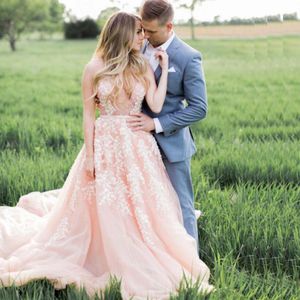 2016 Hot Sell Blush Pink Trouwjurk Sexy Sheer Bling Pearls Kant Applique Jewel Neck A Line Backless Country Bridal Jads Chapel Train