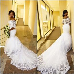 2020 Afrikaanse Goedkope Mermaid Trouwjurken Off Schouder Half Mouwen Kant Applicaties Kapel Trein Plus Size Button Back Formal Bridal Dress