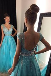 2017 Goedkope Sexy Ice Blue Prom Dresses V-hals Cap Mouwen Bling Crystal Beaded Tule Lange Backless Formele Avond Party Jurken Pageant Jurken