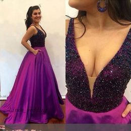 Mouwloze Lange Zuid-Afrikaanse Sexy V-hals Backless Prom Dress Arabische Kralen Kristallen Zakken Avond Party Gown Custom Made Plus Size