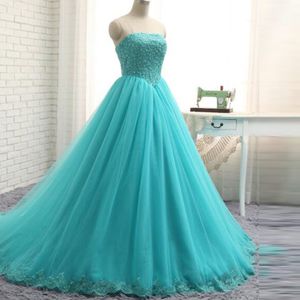 Aqua Blue Tallas grandes Vestidos formales Sin tirantes Sin mangas Con cuentas Apliques de encaje Tul Vestido de noche Corsé Volver Quinceañera Vestido de fiesta