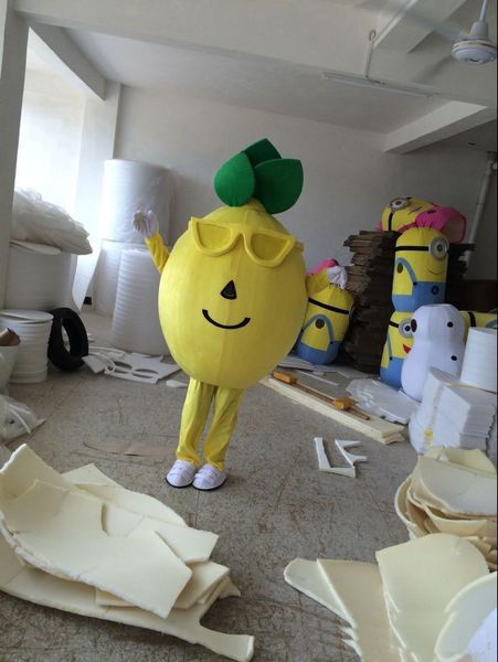 2018 Venta de fábrica Fotos reales calientes Traje de mascota de limón amarillo Tamaño adulto Limón Citron Ropa de dibujos animados Frutas Vestido de fiesta de mascota de Navidad