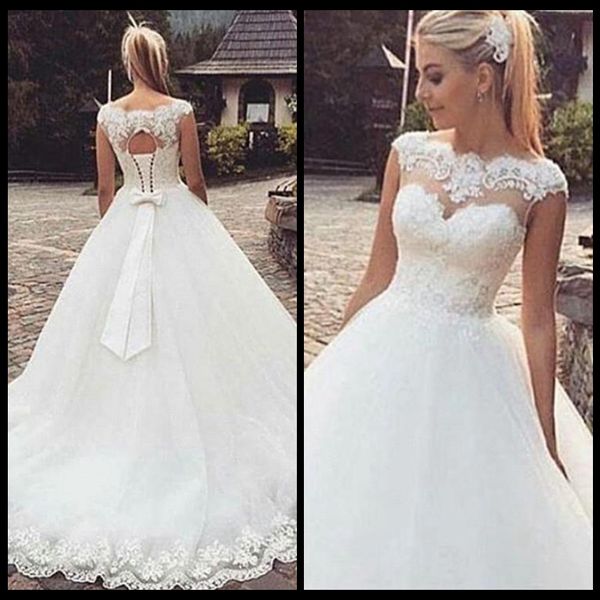 2018 Glamorous Country Lace-Up Back Capped Sleeves Bow Ball Ball Plus Size Organza Vestidos de novia Long Boho Bridal Gowns283Y