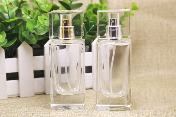 2019 Bouteilles de pulvérisation en verre de parfum de vente chaude de 50 ml avec pompe et capuchon en argent doré, bouteille de pulvérisation en verre pour parfum, bouteille de pulvérisation transparente en gros