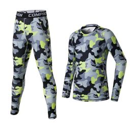 2018 Kids Men Compression Running Pantalons Shirts Sports Survitation Football Football Training Training Colks Basketball Leggings Suits1010342