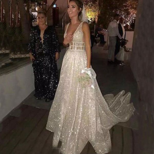 Sparkly trouwjurken Sexy diepe v-hals backless glanzende glitters stof lange bruidsjurken op maat gemaakte bruidjurken uit China