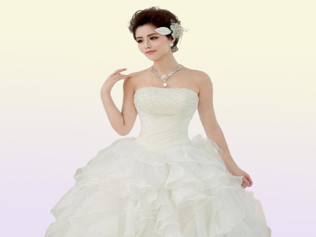 2018 Zomerstrapless trouwjurken Witte witte prinses Mouwloze bruid baljurken Real Po Vestidos de novia7250995