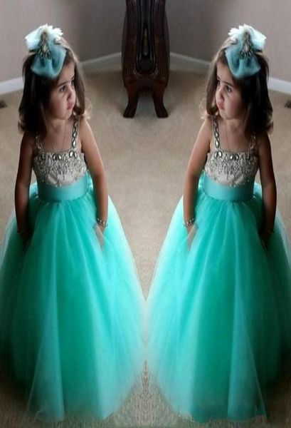 Vestidos de chicas de flujo verde turquesa 2018 vestidos de cumpleaños lindos spaghetti correas de tul de tul de tulio para niños para gir17712229