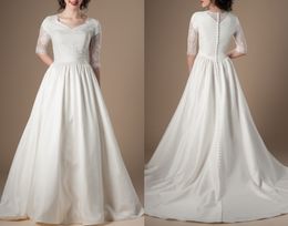 Vintage dentelle longues robes de mariée modestes avec demi-manches transparentes dentelle haut jupe en satin LDS Temple robes de mariée avec poches sur mesure