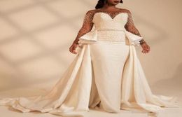2019 African Plus Size Mermaid Wedding Jurken Luxe kralen parels met satijns overkruift trein trouwjurk Vestido de novia3454388
