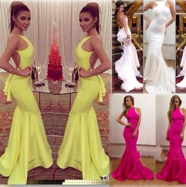 2019 Amazing Sexy Crew Cuello Amarillo Mermaid Vestidos de noche Michael Costello Sexy Backless Formal Ruffles Prom Gowns STRING MA4864642