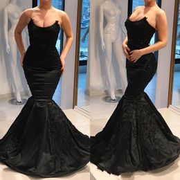 2019 Vestidos de fiesta negros Vestido de sirena Diseñador Escote sin tirantes Apliques Cuentas Lentejuelas Vestidos sin espalda Ropa de noche Tallas grandes Dres formales