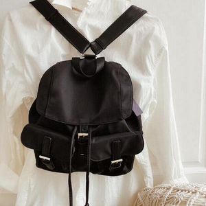 Mochilas de diseñador para hombre y mujer, bolso de mano de nailon, bolso escolar de moda, mochila de viaje de gran capacidad, bolsas unisex
