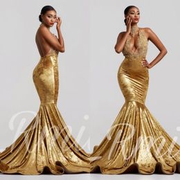 Vestidos de fiesta de sirena de terciopelo dorado sexy Cuello alto sin espalda Tren de corte transparente Vestidos de noche con apliques de encaje Vestido formal ogstuff