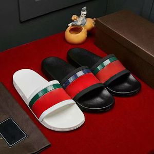 Mannen Slippers Strand Slides luxe glijbaan zomer Vrouwen platte slipper lederen rubberen sandalen zwarte bloemen canvas blauwe bloemen heren damesschoenen outdoor sandaal Met doos