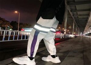2019 Fashion Casual Night Light Stripe Reflective Cargo Pants Men Hip Hop paar Streetwear Joggers Men Men Long Pant Pantalo4654994