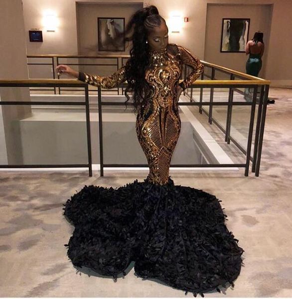 2020 Magníficos vestidos de fiesta dorados y negros Sirena Africana Mangas largas Lentejuelas Vestidos de baile Vestido de fiesta con plumas y volantes Vestido de fiesta Robe De Soiree