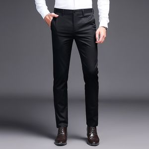 2019 pantalones de vestir para hombre, pantalones de traje caqui, pantalones de negocios negros de marca a la moda, pantalones rectos de trabajo para hombre, pantalones ajustados de Color sólido