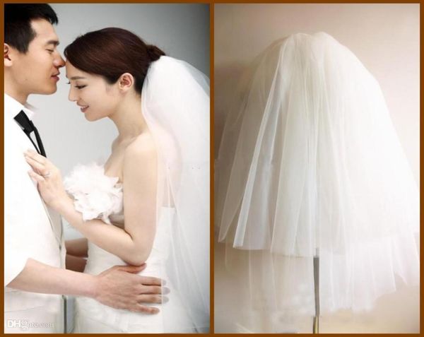 2019 recién llegado velos de novia de niveles cortos tul fondo Natural accesorios de vestido de novia blanco velo esponjoso con Comb8169002