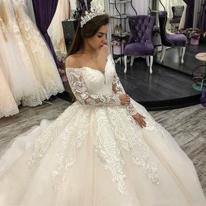 2022 Vintage Puffy Ball Gown Vestidos de novia Jewel Neck Illusion Lace Appliqued Tulle Mangas largas Vestidos de novia por encargo Robe De Mariee Corset Back Sweep Train