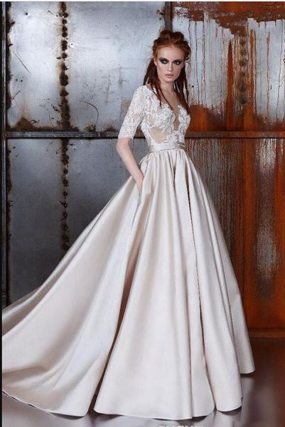 2019 Los más nuevos vestidos de novia de una línea con bolsillos Cuello joya Medias mangas Apliques Botones de satén de encaje Vestidos de novia Vestido de novia vintage