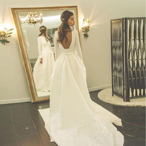 2019 La más nueva joya de manga larga A-Line Vestidos de novia de encaje blanco Ruffle Peplum Sweep Train Backless Vestidos de novia nupciales