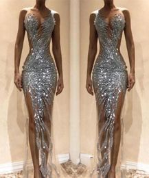 2019 Nigerian Sexy Silver Sequins Sirène perlée Robes de bal formelles sur mesure Sans manches à manches transparente Pageant Spagant GO8140654 sans manches