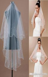 2019 One Layer Wedding Veils 3 meter lange kathedraal lengte steentjes steentjes kralen echt beeld tule bruids sluier met Comb5162073