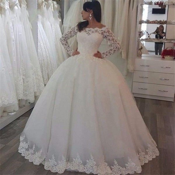 2019 Vestido de fiesta de princesa Vestidos de novia Manga larga Escote barco Encaje de marfil y tul Vestidos de fiesta de boda nupciales de cristal de lujo