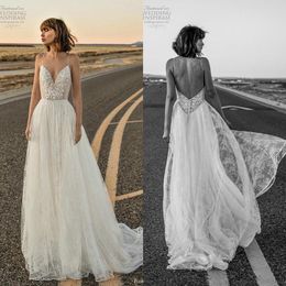 2020 Boho plage robes de mariée bretelles spaghetti dentelle appliques dos nu boutons couverts dos robe de mariée sur mesure robe de novia