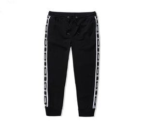 2020 Pantalon décontracté Men Pantalon Pantalon de survêtement LETTRE ELASTIQUE ÉLASTIQUE PLANT PRESTATIQUE PRIMÉE JOGGERS BLANC Noir Pantalon Plus taille CC 09953667