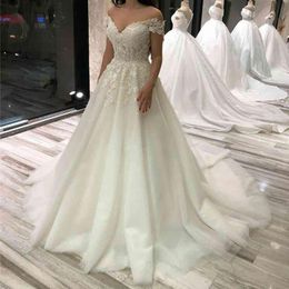 2023 Vintage A Line Vestidos de novia Fuera del hombro Apliques de encaje Ilusión con cuentas de cristal Tren de barrido Tul Árabe Tallas grandes Vestidos de novia formales