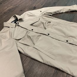 2020 COMPANY konng gonng marca de moda chaqueta de alta calidad primavera y otoño nueva bolsa de almacenamiento plegable abrigo fino cortavientos
