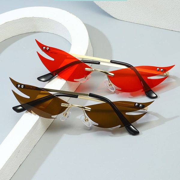 Mode lunettes de soleil volantes sans monture et petites lunettes Cool femmes lunettes de soleil lentilles colorées 7 couleurs en gros