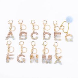 2020 High-end Custom Custom Crystal Epoxy Letter Golden Keychain Star Bur Ball Bag Pandent Creativiteit Key Ring OEM Number Keychains