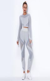 2020 INS Women039s Yogaset Naadloze sportkleding 2-delige set Sweatshirt met lange mouwen, crop top en lange broek met hoge taille Capri Y9114010