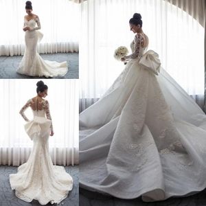 2020 robes de mariée de sirène de luxe pure cou illusion dentelle appliques manches longues bouton arrière arc avec robes de mariée de train détachable