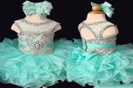 2020 Mint Baby baby Korte Mini Cupcake First Communion Ball Gozs Rufffles Crystals Rhinestones Bloemmeisje Toddler Pageant Dres9566997