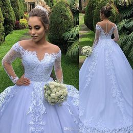 Nuevos vestidos de novia de lujo Dubai A Line Illusion Neck Apliques de encaje Crystal Beaded Tulle Court Train Árabe Tallas grandes Vestidos de novia formales