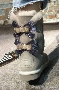 Botas de nieve australianas, zapatos de algodón cálidos a la moda con tubo medio para mujer, talla de raqueta de nieve con taladro Bowknot