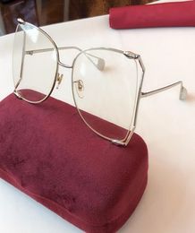 2020 Nouveau créateur de mode lunettes cadre femme irrégulière grand cercle G0252S lunettes de soleil en métal UV400 6318135 de haute qualité avec pa9340840